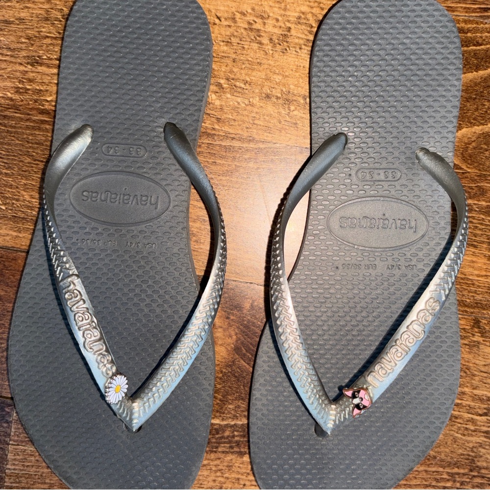 Havaianas Black Flip Flops with Floral Accent